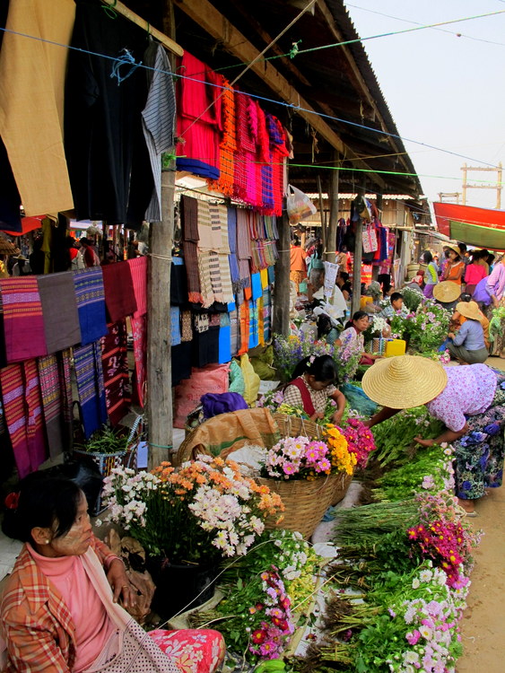 Selling flowers at a market on Inle Lake, Myanmar