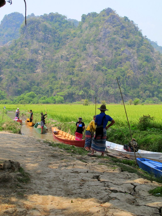 Boat ride outside a cave in Hpaan, Myanmar